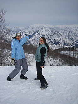 Lindsay and Akiko snowboarding